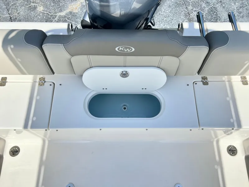 Slide: The Image of 2024 Key West 189 FS boat interior with seating and storage compartments. - 28