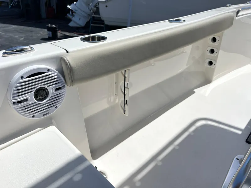 Slide: The Image of 2024 Key West 189 FS boat interior with speaker and rod holders. - 29