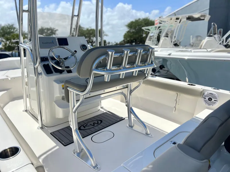 Slide: The Image of 2024 Key West 189 FS boat interior with steering console and seating. - 31