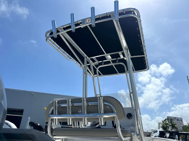 Slide: The Image of 2024 Key West 189 FS boat with T-top under clear blue sky. - 33