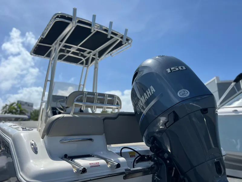 Slide: The Image of 2024 Key West 189 FS boat with Yamaha 150 engine under clear blue sky. - 34