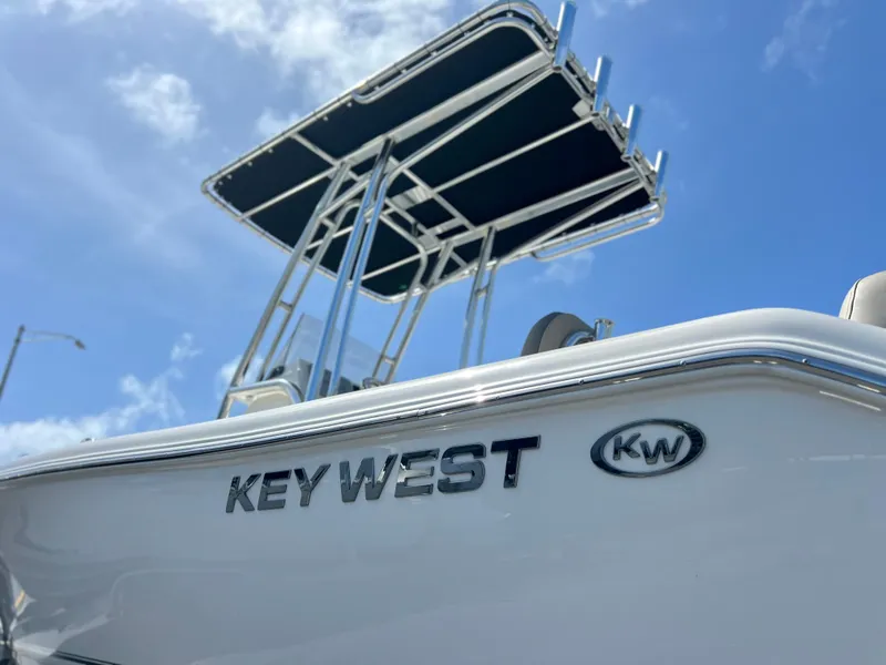 Slide: The Image of 2024 Key West 189 FS boat with T-top against blue sky. - 35