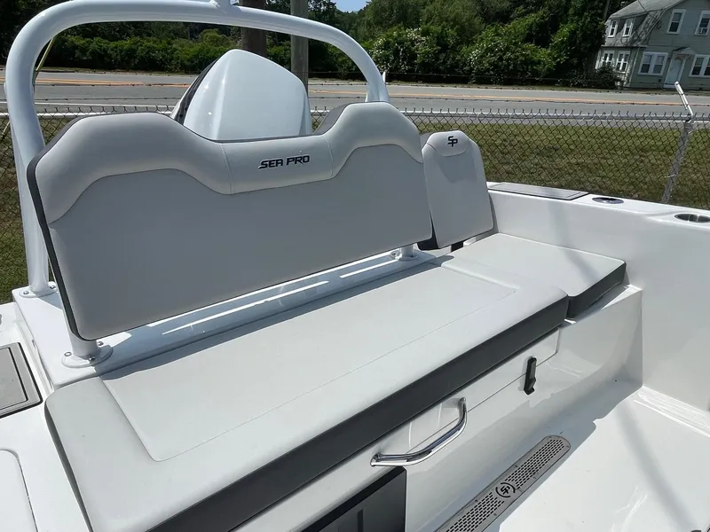 Slide: The Image of 2025 Sea Pro 245 Sandbar boat interior with sleek seating and modern design. - 11