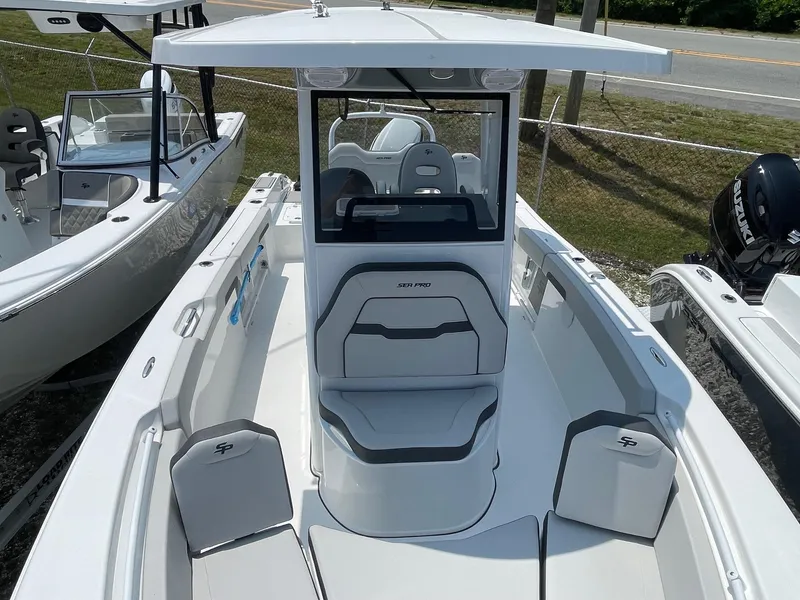 Slide: The Image of 2025 Sea Pro 245 Sandbar boat with sleek design and spacious seating. - 4