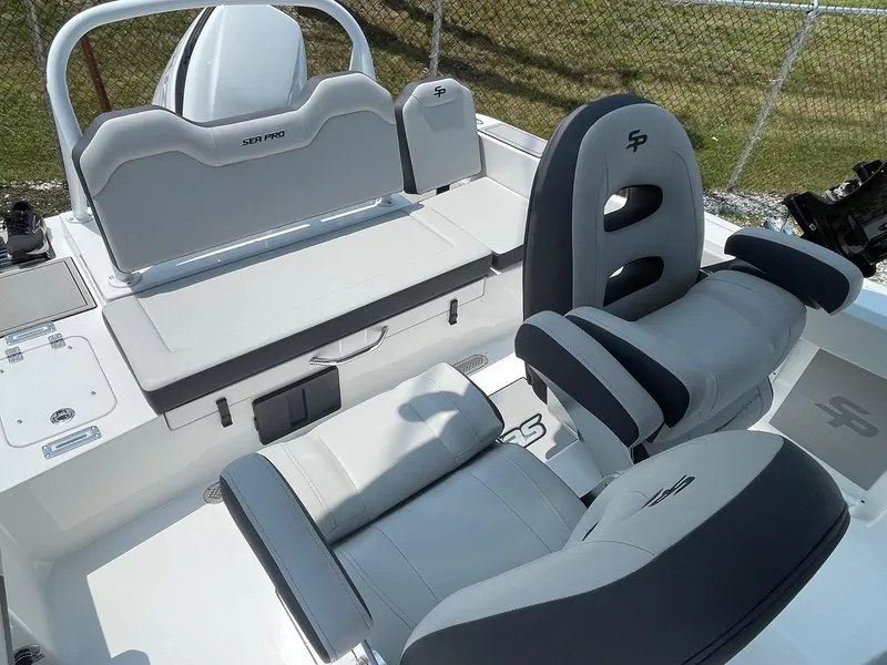Slide: The Image of 2025 Sea Pro 245 Sandbar boat interior with sleek seating and modern design. - 7