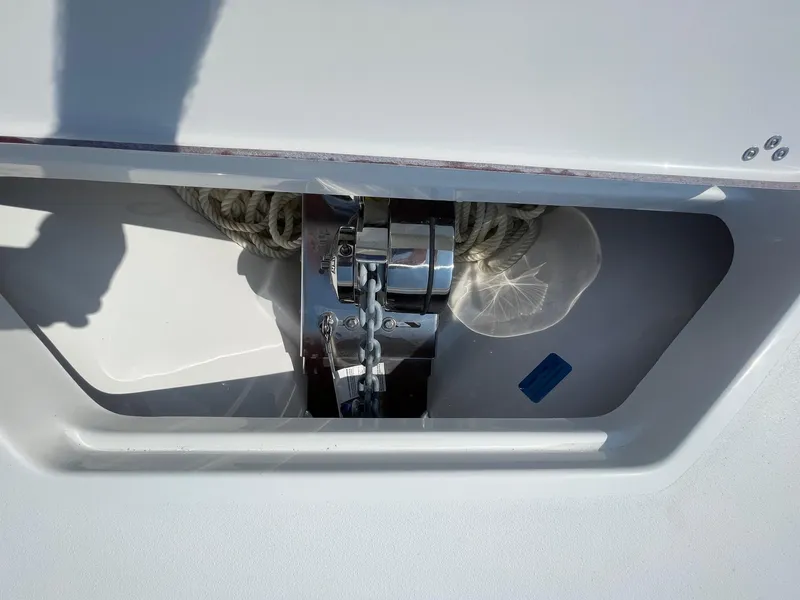 Slide: The Image of Anchor compartment of 2025 Sea Pro 240 Dual Console boat with rope and chain. - 28