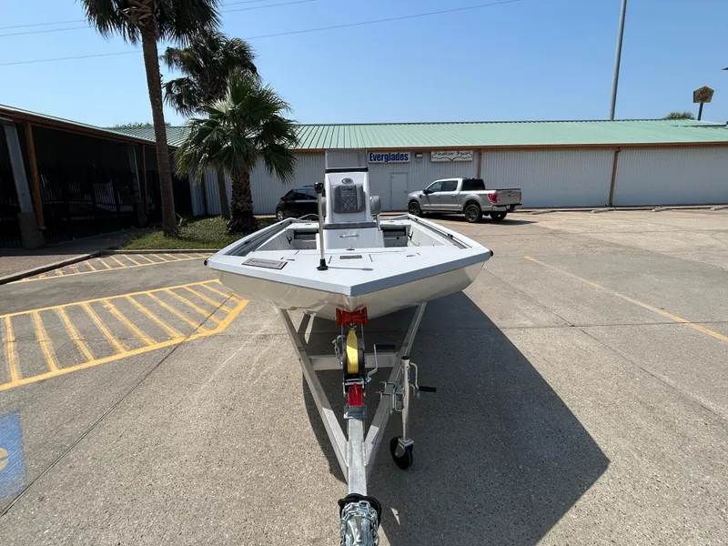 Slide: The Image of 2025 Avid 20 ROGUE CC boat on trailer in parking lot. - 3
