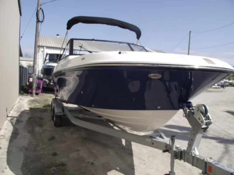 Slide: The Image of 2025 Bayliner Trophy T22SC boat on trailer. - 2