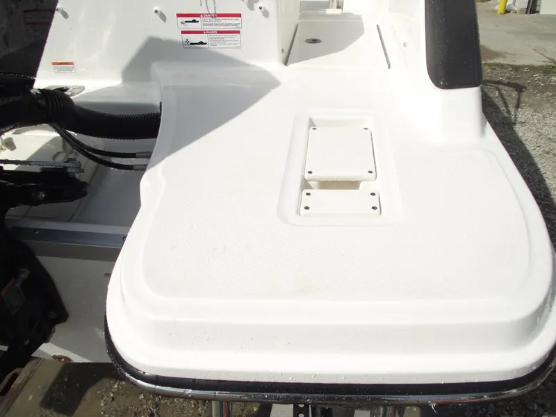 Slide: The Image of 2025 Bayliner Trophy T22SC boat deck, featuring a clean, white surface with mounting area. - 43