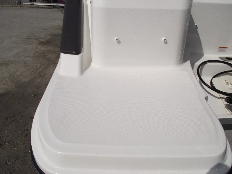 Slide: The Image of 2025 Bayliner Trophy T22SC boat deck, featuring a clean, white non-slip surface. - 44