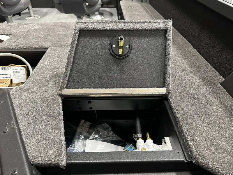 Slide: The Image of 2025 Alumacraft Competitor 185X Sport boat serial number and safety warning label. - 17