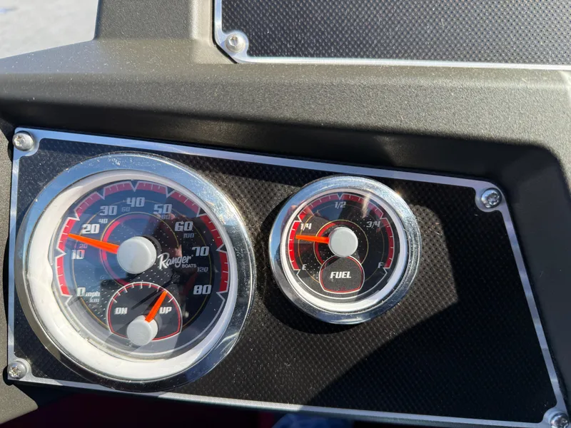 Slide: The Image of Dashboard of 2022 Ranger Z518 boat with speedometer and fuel gauge. - 10
