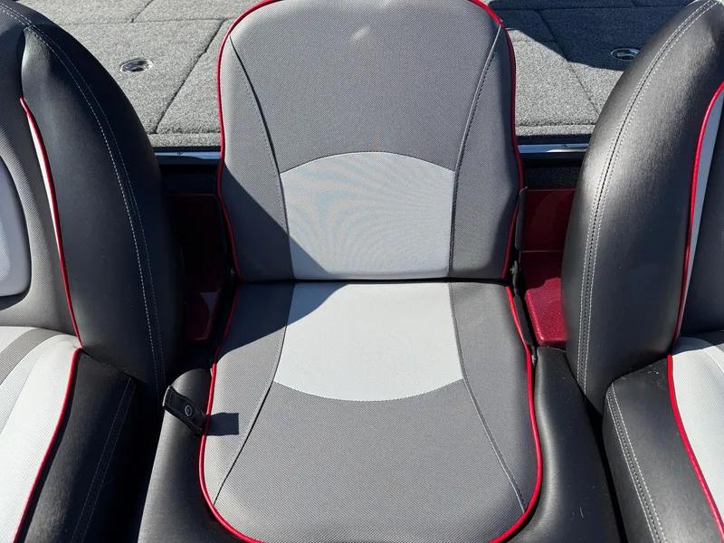 Slide: The Image of 2022 Ranger Z518 boat seat with gray and red accents. - 20