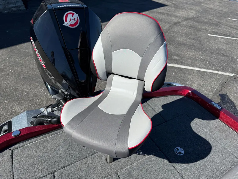 Slide: The Image of 2022 Ranger Z518 boat seat and motor on deck, featuring sleek design and comfort. - 21