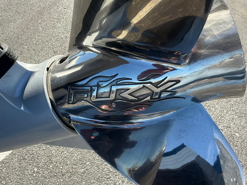 Slide: The Image of Close-up of a 2022 Ranger Z518 boat propeller with "Fury" branding. - 24