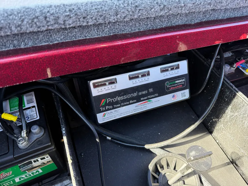 Slide: The Image of Battery compartment of a 2022 Ranger Z518 boat with Professional Series charger. - 30
