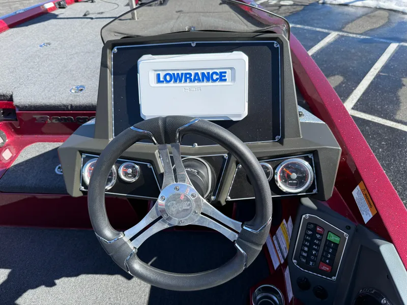 Slide: The Image of 2022 Ranger Z518 boat dashboard with Lowrance HDS display and steering wheel. - 7