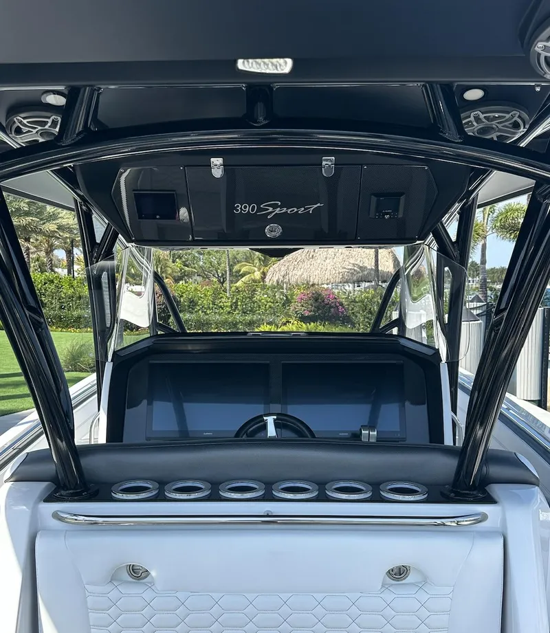 Slide: The Image of 2023 Nor-Tech 390 Sport Center Console boat interior with sleek design and modern features. - 8