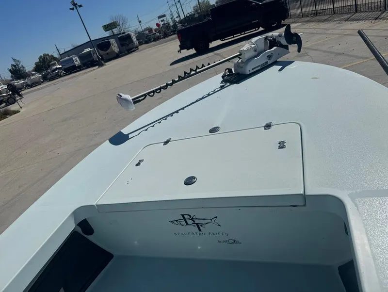 Slide: The Image of 2012 Beavertail Skiffs BT3 boat deck with storage compartment and trolling motor. - 15