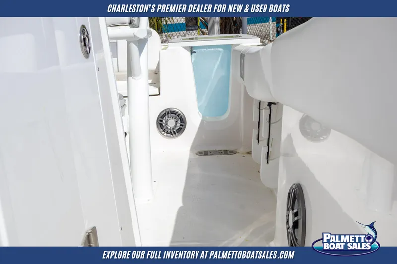 Slide: The Image of 2025 Sea Fox 228 Commander interior, featuring sleek white design and modern amenities. - 15