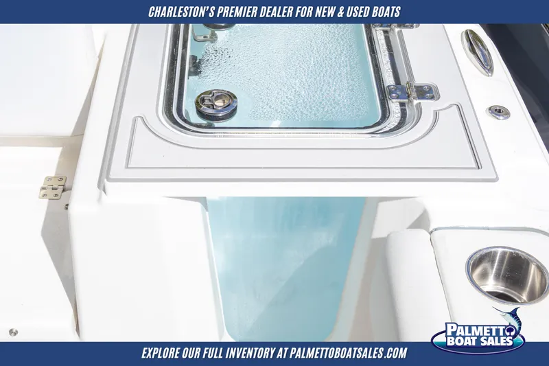 Slide: The Image of 2025 Sea Fox 228 Commander boat detail with livewell and cup holder. - 17