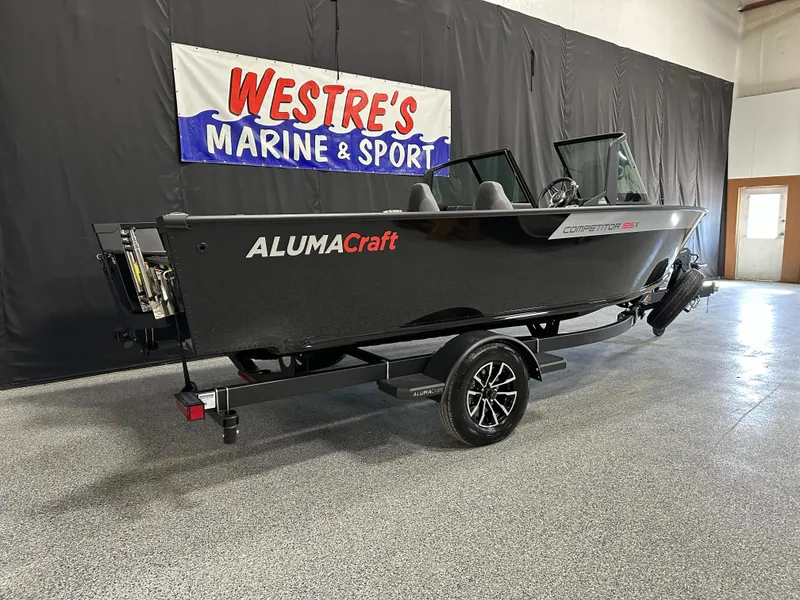 Slide: The Image of 2025 Alumacraft Competitor 185X Sport boat on display at Westre's Marine & Sport. - 2