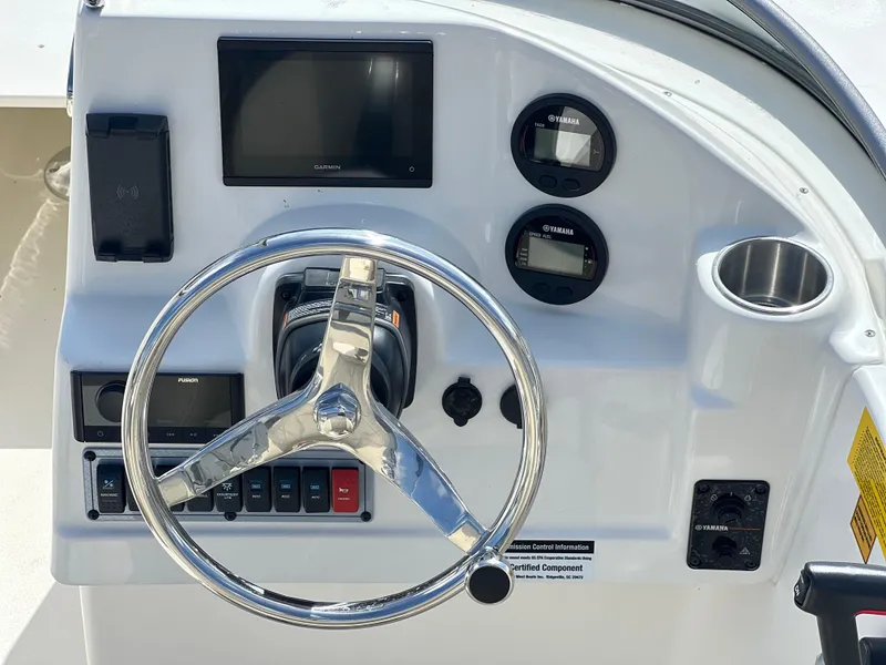 Slide: The Image of Steering console of 2025 Key West 203 DFS boat with modern controls and gauges. - 21