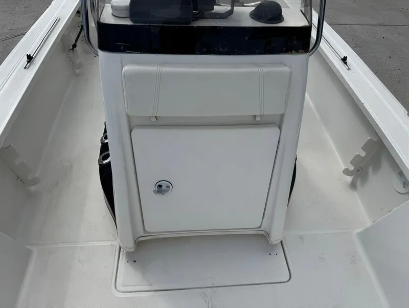 Slide: The Image of 2007 Triton 240 LTS boat console, white interior, clean and well-maintained. - 14
