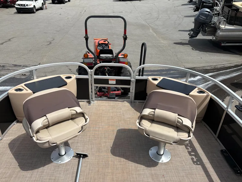 Slide: The Image of 2019 Sun Tracker Fishin Barge 24 DLX with two swivel seats and a spacious deck. - 3