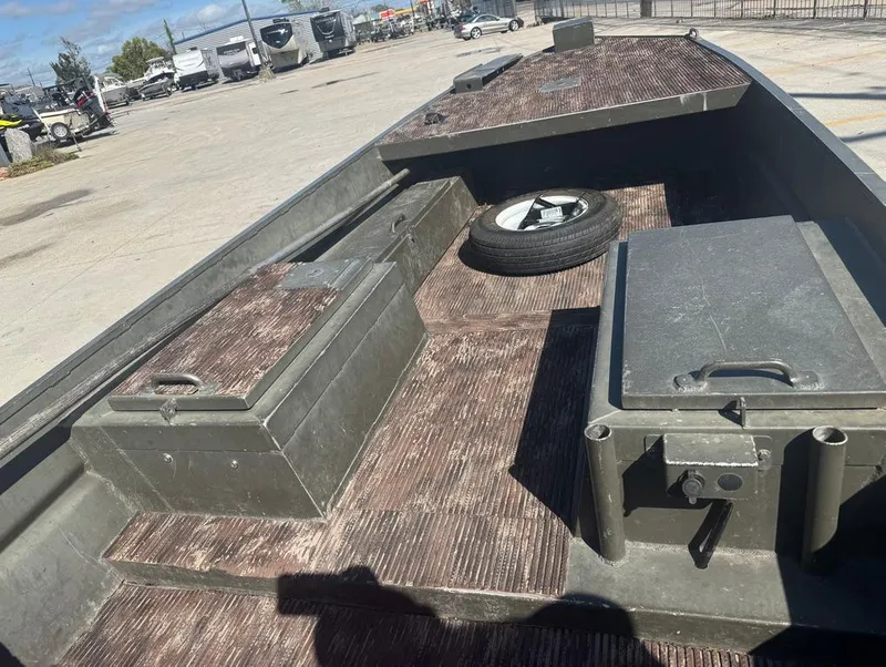 Slide: The Image of 2018 Go-Devil 18x48 Surface Drive Boat with storage compartments and spare tire on deck. - 10