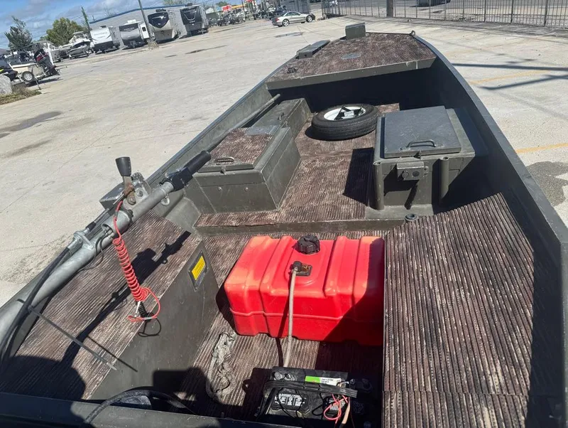 Slide: The Image of 2018 Go-Devil 18x48 Surface Drive Boat with red fuel tank and storage compartments. - 9