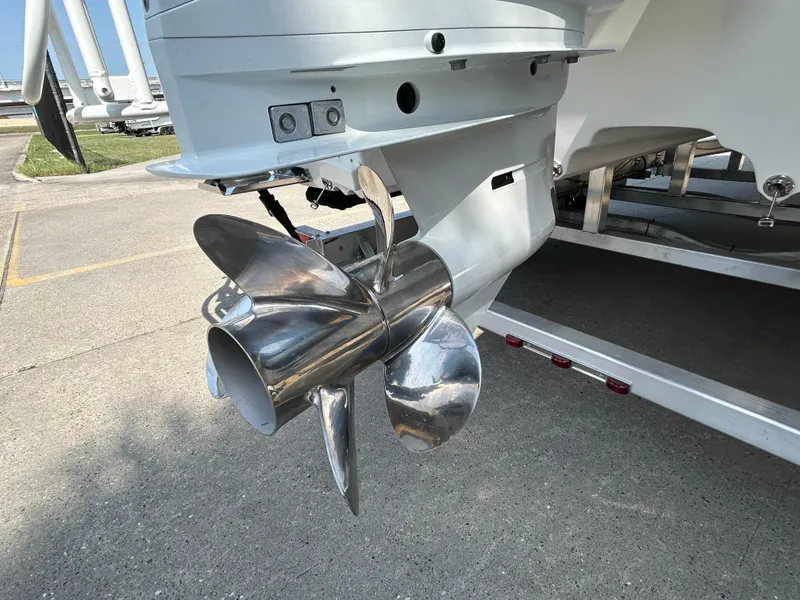 Slide: The Image of Propeller of 2025 Shallow Sport 25 X3 boat on trailer. - 7