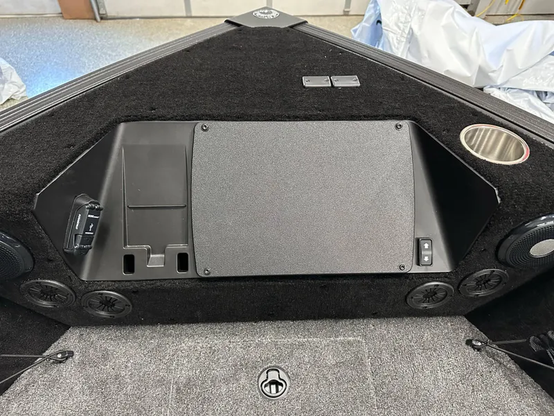 Slide: The Image of Interior of 2025 Alumacraft Competitor 175X Sport boat, featuring control panel and speakers. - 15