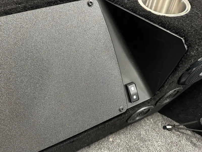 Slide: The Image of Interior detail of 2025 Alumacraft Competitor 175X Sport boat with control panel and cup holder. - 17