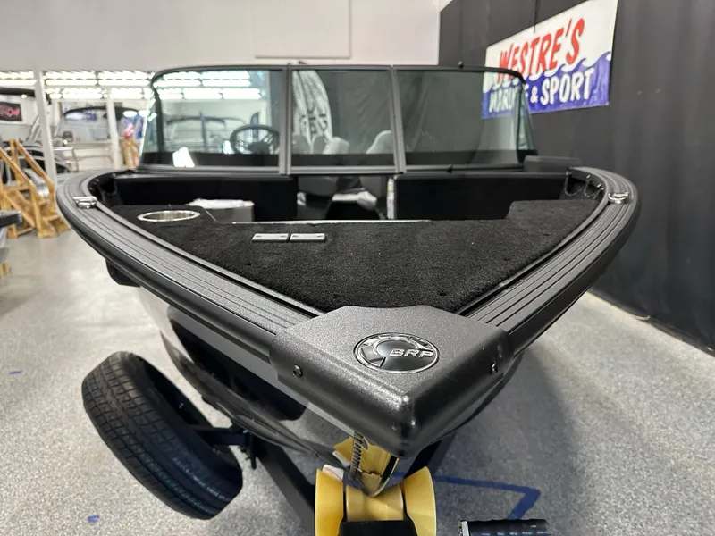 Slide: The Image of 2025 Alumacraft Competitor 175X Sport boat on display in showroom. - 3