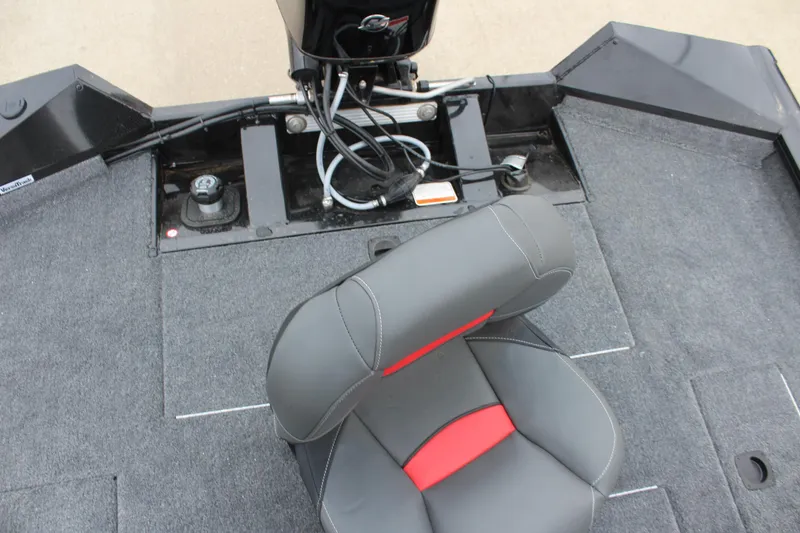 Slide: The Image of 2025 Tracker Pro Team 175 Crappie Edition boat interior with seat and motor. - 12