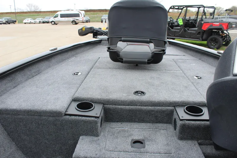 Slide: The Image of 2025 Tracker Pro Team 175 Crappie Edition boat interior with seating and cup holders. - 14