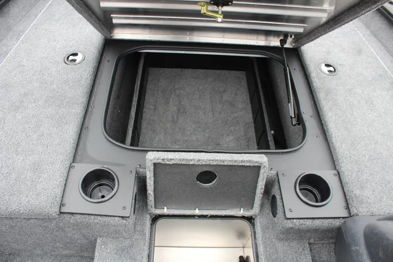 Slide: The Image of 2025 Tracker Pro Team 175 Crappie Edition boat storage compartment with open hatch. - 15
