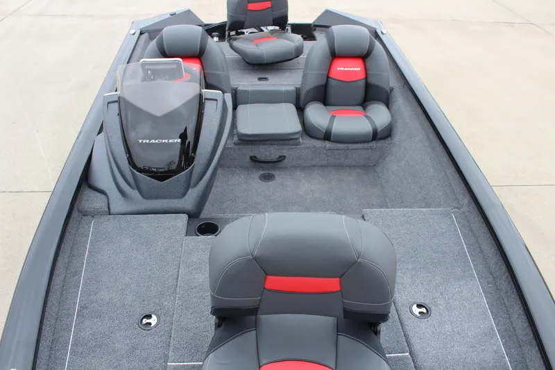 Slide: The Image of 2025 Tracker Pro Team 175 Crappie Edition boat interior with gray and red seating. - 19