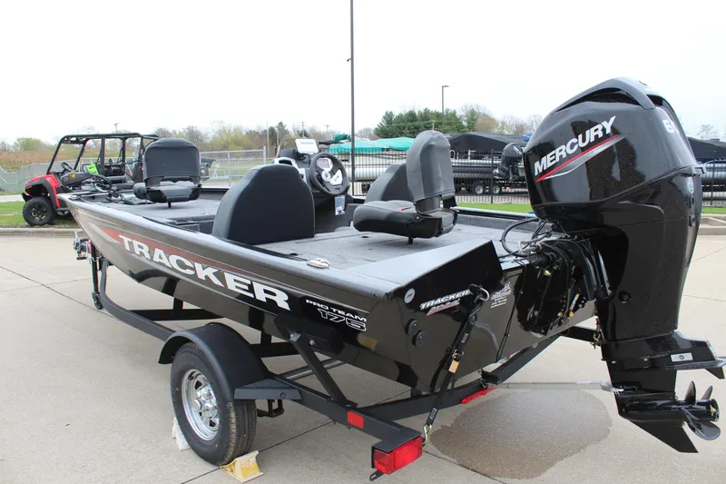 Slide: The Image of 2025 Tracker Pro Team 175 Crappie Edition boat with Mercury engine on trailer. - 5