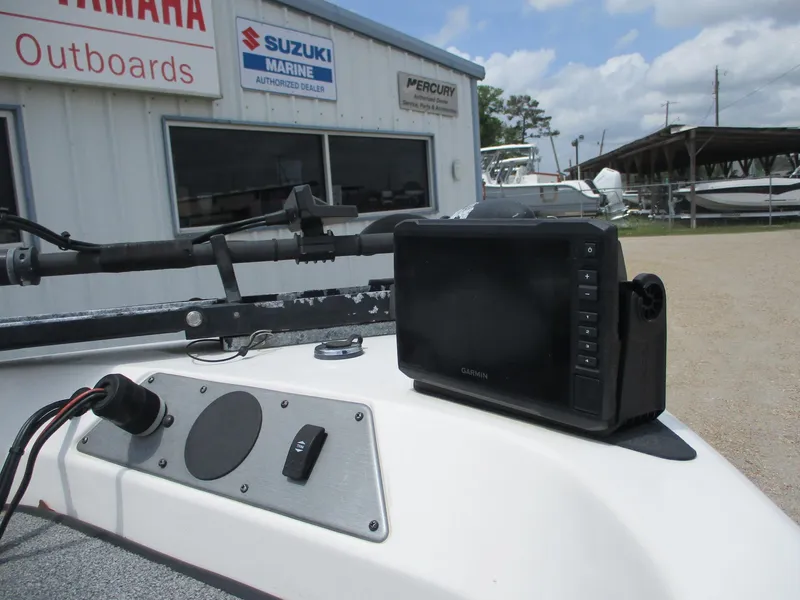 Slide: The Image of 2005 Skeeter SL 190 boat dashboard with Garmin device, near Yamaha and Suzuki dealership. - 9