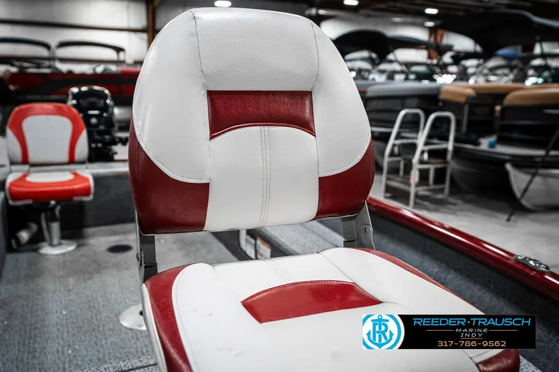 Slide: The Image of Red and white boat seat in a 2021 Tracker Super Guide 17. - 31
