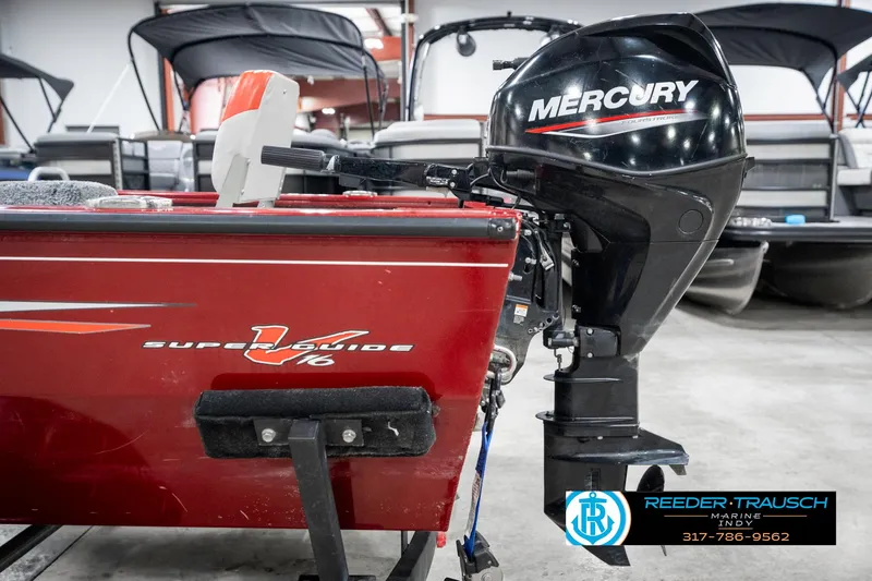 Slide: The Image of 2021 Tracker Super Guide 17 boat with Mercury outboard motor in showroom. - 35