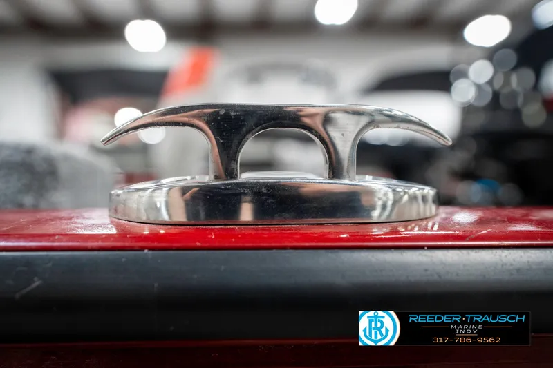 Slide: The Image of Chrome cleat on 2021 Tracker Super Guide 17 boat, close-up view. - 43