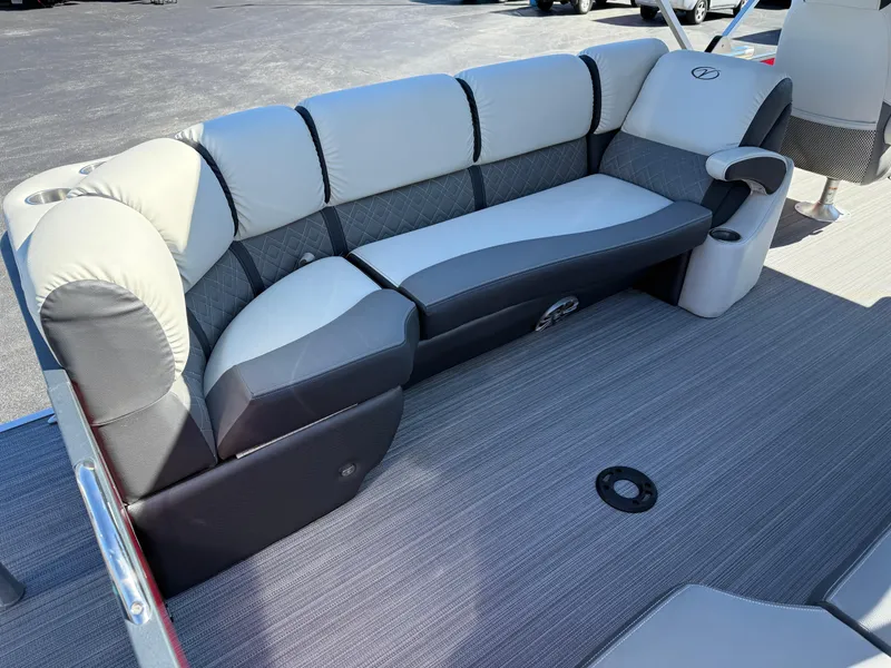 Slide: The Image of Luxurious seating on 2021 Veranda Relax VR22RC pontoon boat, featuring plush gray upholstery. - 17