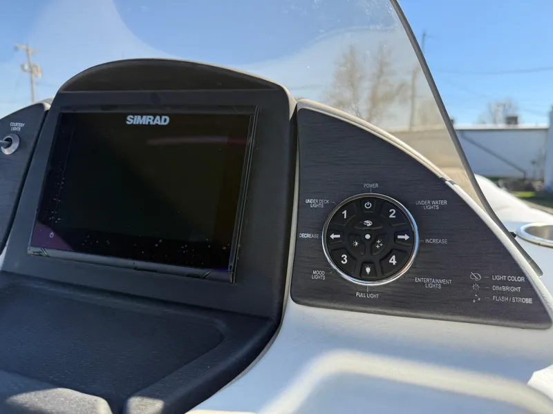 Slide: The Image of Control panel of 2021 Veranda Relax VR22RC boat with Simrad display. - 25