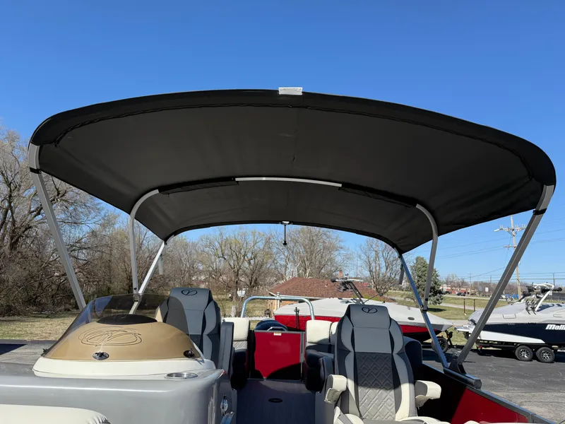 Slide: The Image of 2021 Veranda Relax VR22RC pontoon boat with canopy, featuring comfortable seating and modern design. - 28
