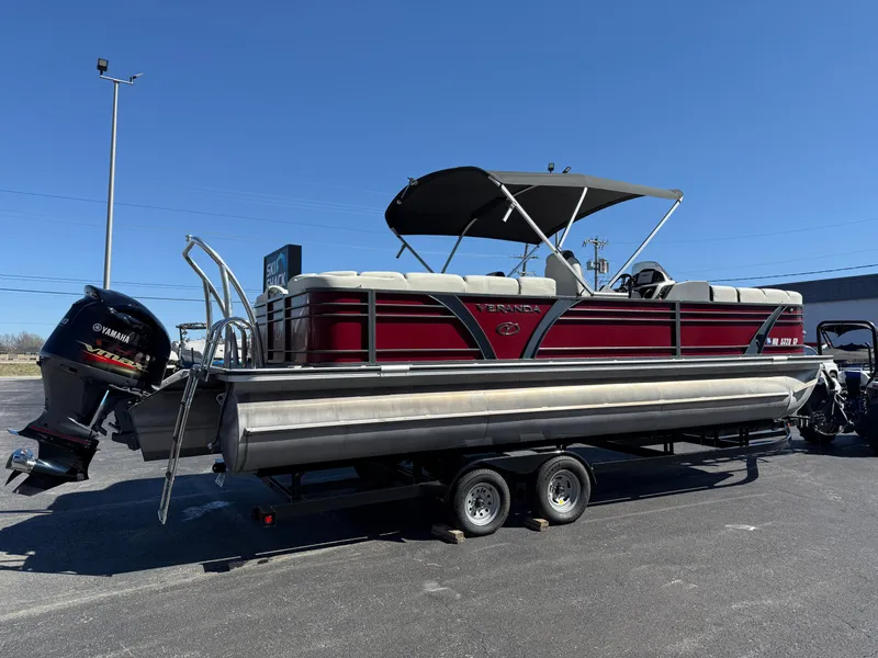Slide: The Image of 2021 Veranda Relax VR22RC pontoon boat on trailer, featuring Yamaha outboard motor. - 7