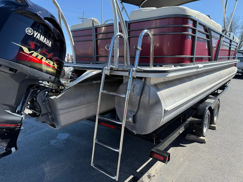 Slide: The Image of 2021 Veranda Relax VR22RC pontoon boat with Yamaha engine and ladder on trailer. - 8