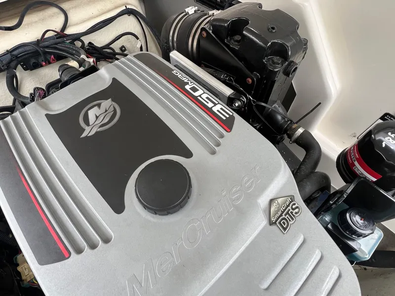 Slide: The Image of Engine compartment of a 2009 Monterey 254FS boat featuring a MerCruiser engine. - 32